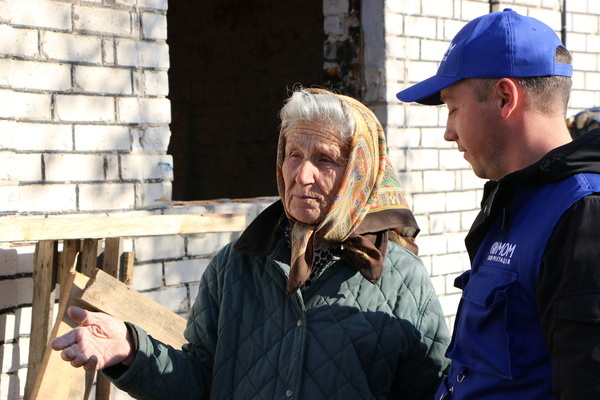 Elderly Halyna who had her house destroyed and repaired by IOM