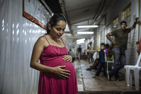 It is the day before she is due to deliver. Neida has been staying at a transit centre in Cucuta with her husband and two children while she awaits the Caesarian Section she could not get at home. âIâve already lost two children to miscarriages in Venezuela. When I became pregnant again, I decided to come to Colombia to find a way to get a C-section. I was told this was impossible in Venezuela but since arriving Iâve received health care and exams at the local hospital. Tomorrow Iâll give birth to my child. I hope it is a boy. I will name him Alberto Antonio, Alberto for my grandma who was named for Alberta and Antonio for my father who passed away. âI was scared to leave, because my country is my country, but fear wasnât enough to stop me. I thought about my family, my daughter, to make them feel better and give them a better lifestyle. When we crossed the bridge in Cucuta, we didnât know where we would stay or find food for us. But you can always find people who help you on your way. I realized Iâm going to make it in this country. It will be a challenge but I will overcome. Colombia is a country that opened its doors to me,â said Neida. A new policy enacted by the Colombian government will allow her child to be born a Colombian citizen. She is staying at IOMâs Migrant Transit Centre in CÃºcuta where Venezuelans can receive food, medical assistance, and a safe place to stay and rest during their journey. The centre caters to people with health conditions, pregnant women, single mothers, trafficking victims, the elderly and people experiencing malnutrition and other vulnerabilities.