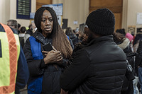 IOM Deputy Director General Ugochi Daniels speaks with TCNs who have arrived to the the Keleti train station in Budapest, Hungary. She has also come to see IOMâs humanitarian response in the key points of arrival for Ukrainian refugees and Third Country Nationals (TCNs) arriving to Hungary.