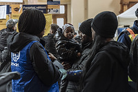 IOM Deputy Director General Ugochi Daniels speaks with TCNs who have arrived to the the Keleti train station in Budapest, Hungary. She has also come to see IOMâs humanitarian response in the key points of arrival for Ukrainian refugees and Third Country Nationals (TCNs) arriving to Hungary.