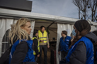 IOM Deputy Director General Ugochi Daniels visits the Michalovce hotspot in Slovakia. The Michalovce hotspot includes an IOM tent where IOM provides essential information, DTM, toys for children, and information advising refugees and TCNs on the potential risks of trafficking that can occur for those planning to take further transportation to other neighboring countries.