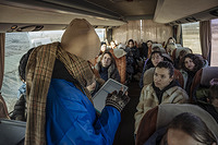 IOM staff members conduct DTM surveys to recent Ukrainian refugee arrivals at Palanca, Moldova.