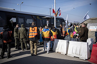Ukrainian refugees having just crossed the Medyka border in Poland getting assistance from IOM to their next destination. March 20, 2022