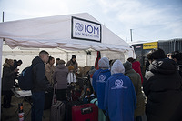 Ukrainian refugees having just crossed the Medyka border in Poland getting assistance from IOM to their next destination. March 20, 2022