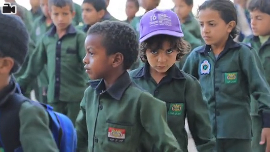 Footage of children at school, classrooms, displaced children studying