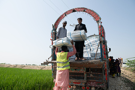 IOM Staff carry out a distribution of relief items to flood-affected people in Sindh and Balochistan provinces. The relief items are distributed in coordination with various partners which include shelter kits. In Mid-June 2022, Pakistan witnessed extreme flooding which damaged more than 1.14 million houses and over 765,000 houses have been destroyed across the country. An estimated 33 million people across the country have been impacted by the floods.
IOM Staff carry out a distribution of relief items to flood-affected people in Sindh and Balochistan provinces. The relief items are distributed in coordination with various partners which include shelter kits. In Mid-June 2022, Pakistan witnessed extreme flooding which damaged more than 1.14 million houses and over 765,000 houses have been destroyed across the country. An estimated 33 million people across the country have been impacted by the floods.