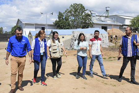 IOM Honduras staff visiting the shelter construction site.